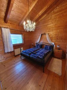 Postel nebo postele na pokoji v ubytování Holzkastl