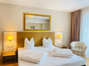 Postel nebo postele na pokoji v ubytování Hotel Malerhaus