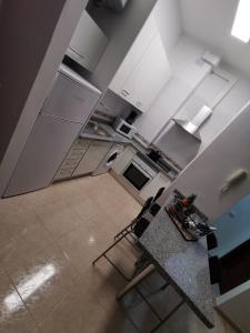 A kitchen or kitchenette at 23 DE ENERO