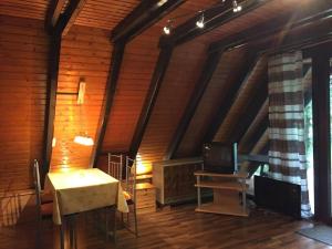 Posezení v ubytování Familienfreundliches-Ferienhaus-mit-Waldrand-Lage + 8 fotografií