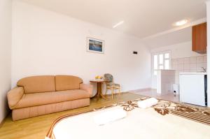 Kuchyň nebo kuchyňský kout v ubytování Apartmani Popović