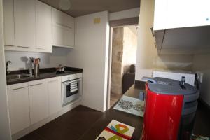 Kuchyňa alebo kuchynka v ubytovaní Apartamento Voramar