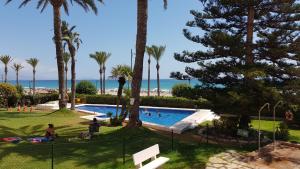 The swimming pool at or close to Loft Playa Muchavista