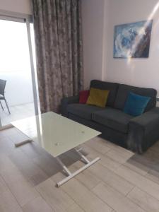 A seating area at VV Canteras Sol y Playa