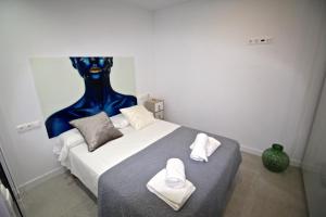 Säng eller sängar i ett rum på Apartamento Grande y Luminoso en el Centro de Alicante