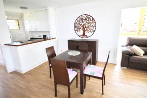 A kitchen or kitchenette at Apartamento El Tridente