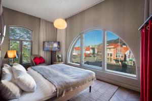 Кровать или кровати в номере Bergen Børs Hotel