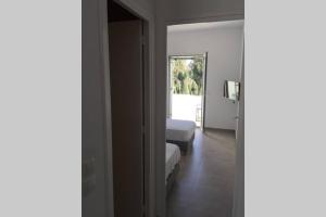 Postel nebo postele na pokoji v ubytování House Phos