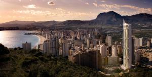 a view of a city with a mountain in the background at Skyscraper apartment with panoramic views - floor 38 in Benidorm