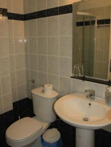 Koupelna v ubytování Esperanza Hotel
