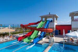 a water slide in a pool at a resort at Orange County Belek in Belek