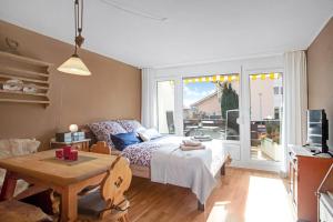 Postel nebo postele na pokoji v ubytování Allgäu Alpenglück mit Sauna und Pool + 11 fotografií