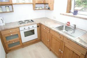 Kuchyň nebo kuchyňský kout v ubytování Das kleine Paradies