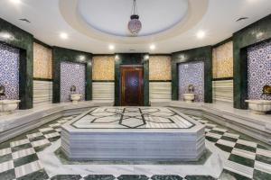 a rendering of a room with a bed in the middle at Orange County Belek in Belek