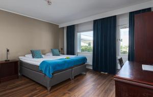 Postel nebo postele na pokoji v ubytování Apple Hotel & Konferens Göteborg
