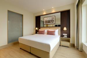 Lemon Tree Hotel, Jhansi客房内的一张或多张床位