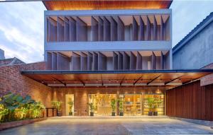 an external view of a building with a facade at Cool Living in Jakarta