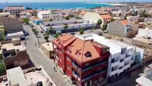 an aerial view of a city with a red building at Apartamento Llana in Santa Maria