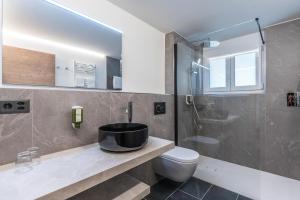 Koupelna v ubytování Hotel Hemizeus & Iremia Spa