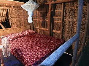 Кровать или кровати в номере Spicy23 - M' Pai Bay