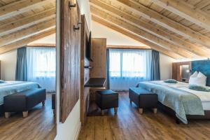 Postel nebo postele na pokoji v ubytování Hotel Hemizeus & Iremia Spa