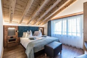 Postel nebo postele na pokoji v ubytování Hotel Hemizeus & Iremia Spa