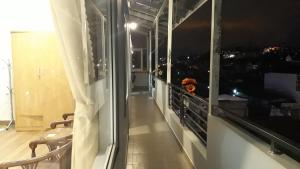 Balkón nebo terasa v ubytování Dang Nguyen Guesthouse