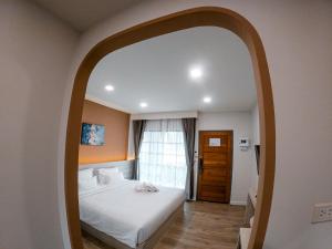 Postel nebo postele na pokoji v ubytování Li CALLA Resort Trat