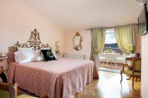 Postel nebo postele na pokoji v ubytování Hotel Principe