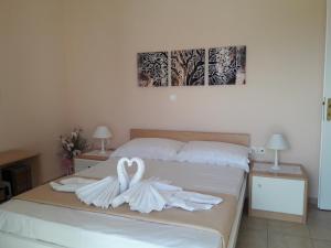 A bed or beds in a room at Estella sorelle 1