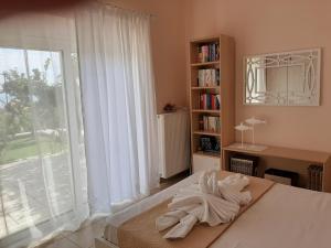 A bed or beds in a room at Estella sorelle 1