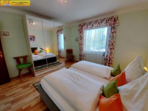 Postel nebo postele na pokoji v ubytování Apartment Central by FiS - Fun in Styria