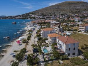 an aerial view of a town next to the water at Apartments Gina in Trogir
