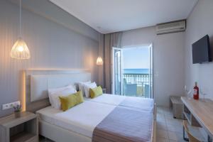 Voodi või voodid majutusasutuse Hotel Rossis toas