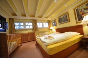 En eller flere senge i et værelse på Grosses-Reethaus-Sanddorn