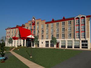 a large building with a lawn in front of it at Future Inns Halifax Hotel & Conference Centre in Halifax