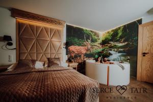 Posteľ alebo postele v izbe v ubytovaní Serce Tatr Residence Zakopane - blisko Krupówek