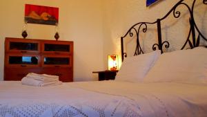 Postel nebo postele na pokoji v ubytování Agriturismo La Terra + 37 fotografií