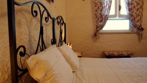 Postel nebo postele na pokoji v ubytování Agriturismo La Terra