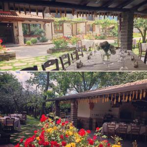 2 foto di un patio con tavolo e fiori di AGRITURISMO Da Baffone a Santo Stefano del Sole