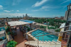 a view of a swimming pool on top of a building at Hotel Casa Tere in Cartagena de Indias