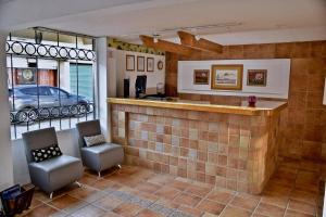 The lobby or reception area at Hotel Posada Centenario