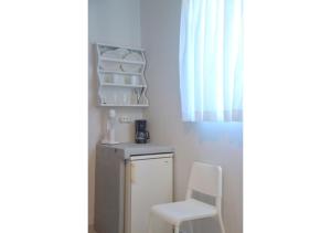 A kitchen or kitchenette at Tsakonas Plakes Studios