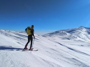 a person on skis on a snow covered slope at Рада Дараба in Krasnik