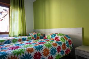 Postel nebo postele na pokoji v ubytování Les 2 Soeurs