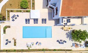 an overhead view of a swimming pool in a house at Cretan Dream Villa in Georgioupolis