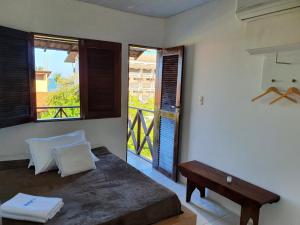 Ένα ή περισσότερα κρεβάτια σε δωμάτιο στο Condomínio Merepe Residence Duplex +32 φωτογραφίες