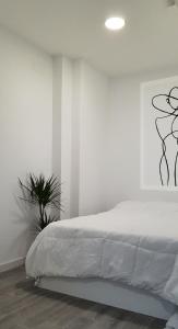 Postel nebo postele na pokoji v ubytování Apartamento en el absoluto centro 2B
