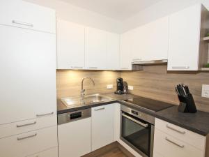 Kuchyň nebo kuchyňský kout v ubytování Apartment in Schwendau near Horbergbahn