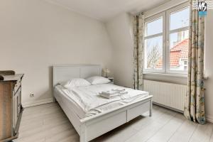 Posteľ alebo postele v izbe v ubytovaní MS Apartments SopotForSix